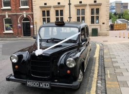 Black London Taxi for wedding hire in Bedford